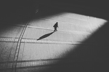 silhouette of a person on the street