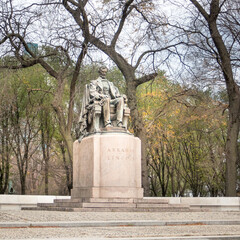 Full view of seated Lincoln by Saint-Gaudens in Grant Park, Chicago, late autumn, showing trees...