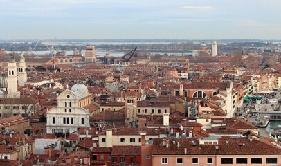 Fototapeta na wymiar Roofs of Venice city. Panoramic photo of beautiful Italian city. Popular tourist destinations concept. 