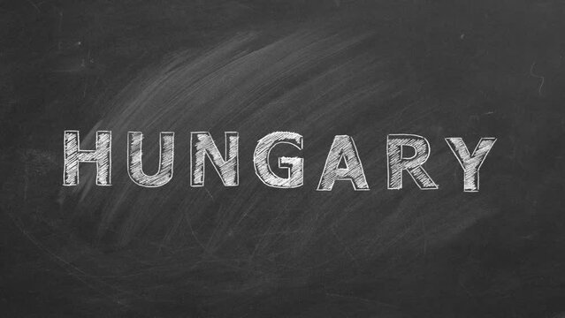 Lettering Hungary drawn with chalk on a blackboard. Hand drawn animation.