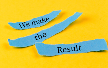 WE MAKE RESULT text on a blue pieces of paper on yellow background, business concept