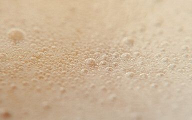 Fototapeta na wymiar Coffee foam with large plan. Macro texture
