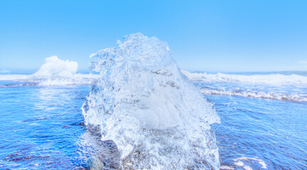 Iceberg pieces on diamond beach near Jokulsarlon lagoon - Iceland