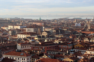 Fototapeta na wymiar Venice city from above. Beautiful panoramic view of Italian city. Golden hour photo of Italy. Romantic tourist destination concept. 