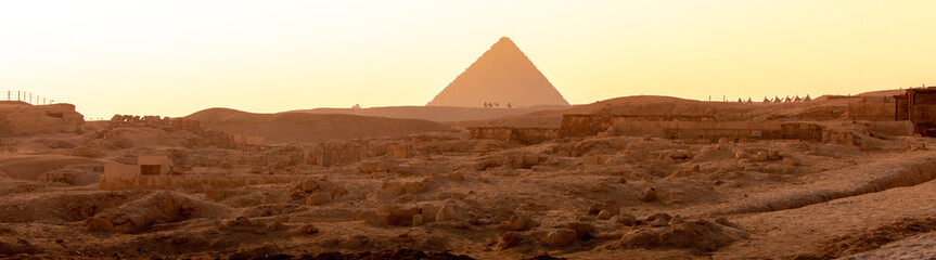 Panoramic photograph of the sunset over the pyramid of Menkaure