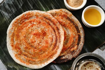 South Indian vegetarian breakfast idli karam podi dosa sambar chutney powder ghee and filter coffee