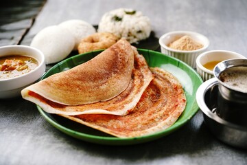 South Indian vegetarian breakfast idli karam podi dosa sambar chutney powder ghee and filter coffee