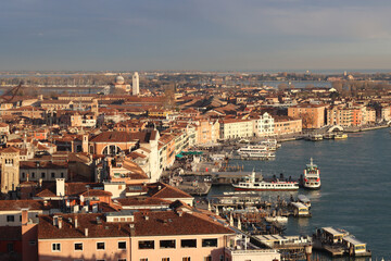 Fototapeta premium Venice city from above. Beautiful panoramic view of Italian city. Golden hour photo of Italy. Romantic tourist destination concept. 