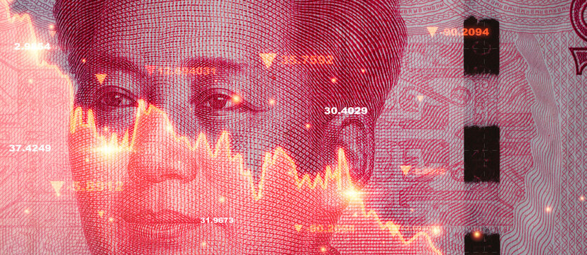 Mao Tse Tung face on Yuan banknotes with stock market decreasing graph chart for Trading currency exchange money transfer and China economy recession concept.