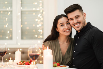 Portrait of beautiful loving couple celebrating Valentines Day at home