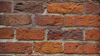 Vertical segment of a red brick wall | texture, backdrop, mockup, background