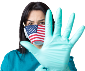 A girl in a medical mask and gloves holds an American flag in her hands. Coronavirus concept. Protect your health. .Stop the threat of a pandemic.