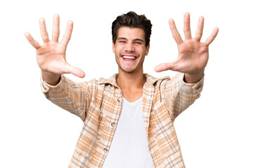 Naklejka premium Young handsome caucasian man over isolated background counting ten with fingers