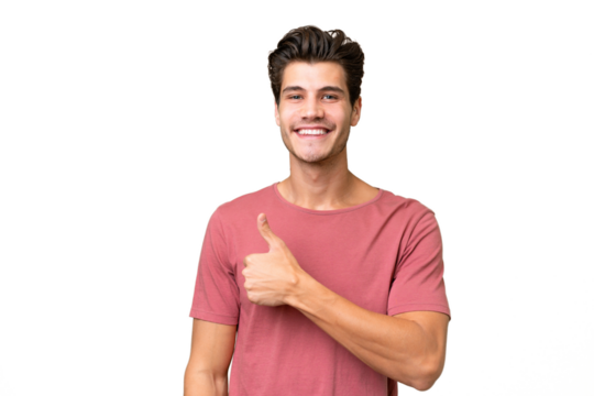 Young handsome caucasian man over isolated background giving a thumbs up gesture