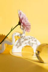 abstract minimalism. flower on a pastel background with geometric elements for postcard or banner design.