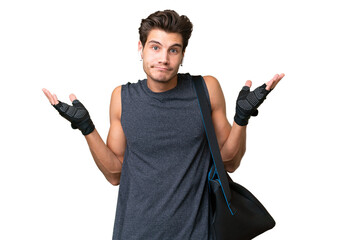 Young sport caucasian man with sport bag over over isolated background having doubts while raising...
