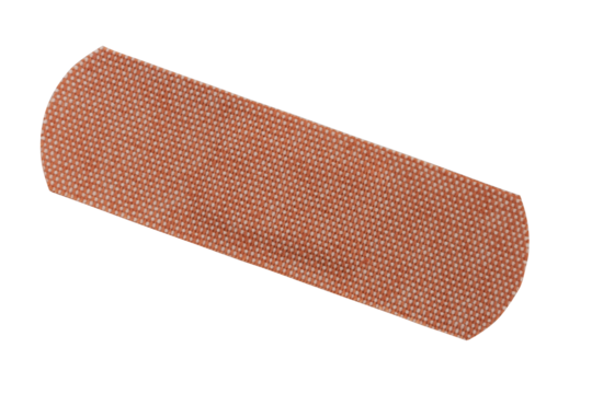 Close-up of fabric adhesive bandage isolated on white