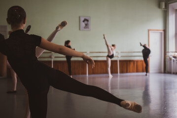 ballet dancer in ballet pose in a class, vintage image, copy space © malgo_walko