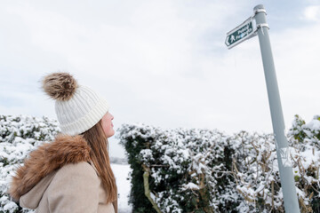 Woman on hiking path in winter