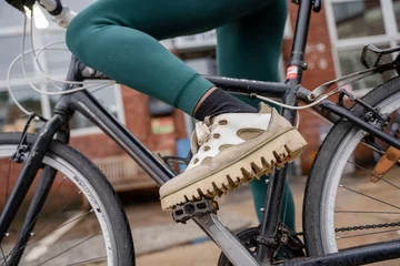 Foto op Canvas Low section of woman on bicycle © Cultura Creative