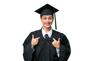 Young university graduate  caucasian woman over isolated background with surprise facial expression