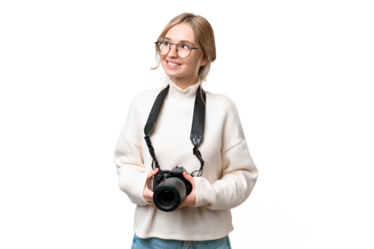 Young photographer English woman over isolated background looking up while smiling - Powered by Adobe