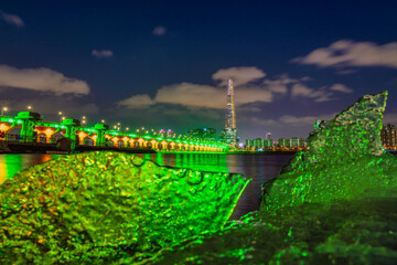 Seoul Subway and Lotte Tower at Night, In winter, the weather is cool and the sea is frozen. South...