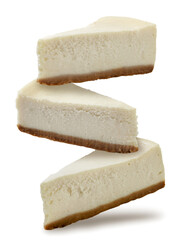 Cheesecakes falling close up on a white background. Isolated