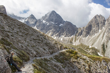 Fototapeta na wymiar man trekking in the mountains, Alps in Austria, Lienzer Dolomiten, East Tyrol