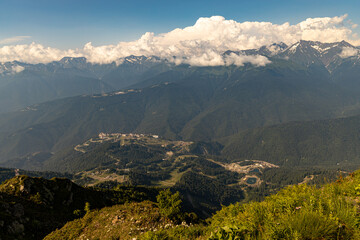 Russia, Sochi, Krasnaya Polyana. Summer landscapes of the Caucasus mountains in Rosa Khutor. View of the peaks of the mountains