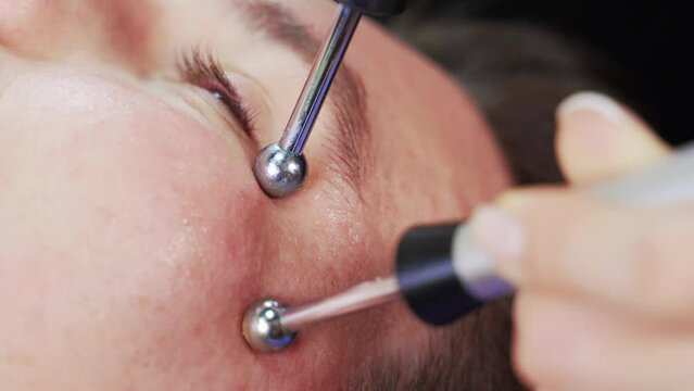 close-up microcurrent procedure treatment of chin lines microcurrent procedure in a beauty salon, facial treatments