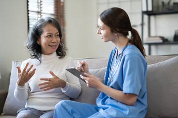 Fototapeta premium Professional Doctor and patient are discussing at clinic, Happy young female doctor provide medical care. .