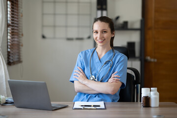 Fototapeta premium Professonal famale checking young woman heart rate. Medical care concept.