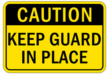 Machine guarding sign and labels keep guard in place