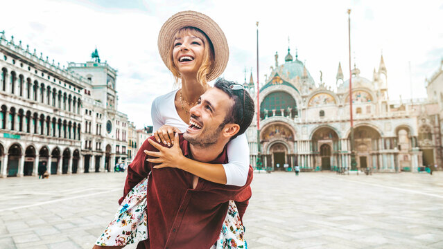 Romantic Young Couple Enjoying Vacation In Venice, Italy 