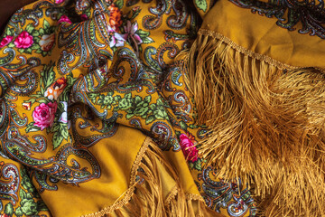 Colorful Boho flowers fabric. Fashionable collection of accessories for women. Detail of wardrobe