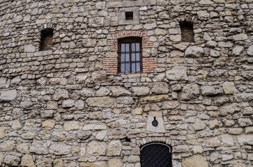 Old stone wall with doors and windows of the Powder Tower in the center of Lviv.
