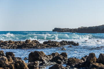 Waves crashing on rocks on  Cap d'Antibes, France
