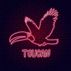 Toucan bird red neon light sign vector. Glowing bright icon toucan bird sign © Meowcher24