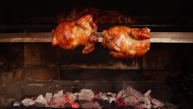video of peruvian food called "pollo a la brasa" going around in an oven. Peruvian food concept and traditions.