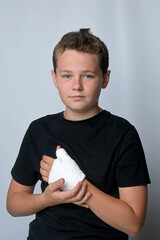 child with one hand in plaster