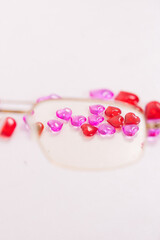 Tablets, capsules for vision. Vitamins in the form of hearts with glasses on a white background. Diopter lenses, myopia, farsightedness. Ophthalmologist, optometrist, eye health. High quality photo