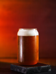 A glass of beer on a granite stand
