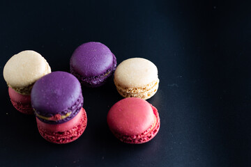 mini macaron different colour in a dark background