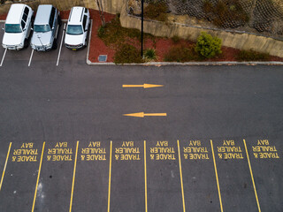 Aerial view of carparks at hardware store marked for trailers or trade vehicles