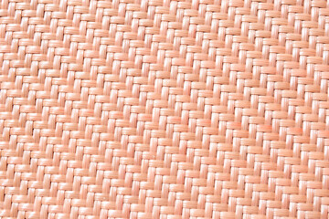 photo of rattan woven background pink color. rattan woven background. rattan woven background