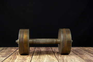 Fototapeta premium Iron Heavy Dumbbell. Sports equipment. Gray