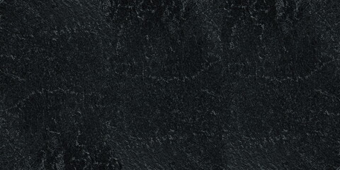 Black rough stone surface widescreen grunge texture. Dark abstract textured large background