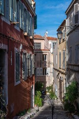 Marseille, Provence, France - Facades of houses in a narrow street in old town.
