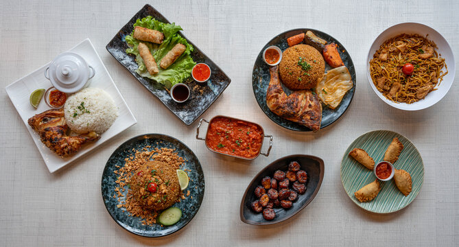 Paris, France - 01 18 2023: African and Thai culinary Still Life. Mix of African and Thai dishes top view